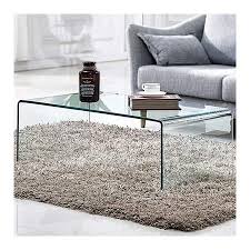 As styles comes and go, it adapts and keeps its position in the spatial configuration of the modern coffee tables are of many different types, with various shapes and can be made of a variety of materials so let's pick something specific to focus. Amazon Com Premium Tempered Glass Coffee Table Clear Coffee Table Small Modern Coffee Table For Living Room Match Well With Rug 40x20x14 Kitchen Dining