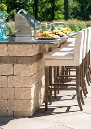 For instance, you want your island to have a sink instead of a mini fridge or two drawers instead of a single cabinet. Outdoor Kitchen With Grill Island And Paver Patio Unilock