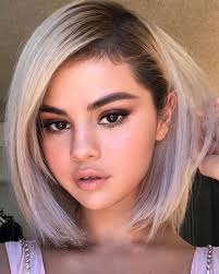 Almost four years after temporarily going blonde, natural brunette selena gomez is back to blonde—and you need to see it. Selena Gomez Reveals A New Pastel Lavender Hair Color On Instagram Vogue