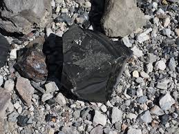Obsidian (/əbˈsɪdiən/) is a naturally occurring volcanic glass formed as an extrusive igneous rock. Obsidian Wikipedia