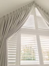Curtain rods should extend at least 4 on either side of the window so it makes the window look wider. Hugedomains Com Window Curtains Bedroom Window Curtains Curtains