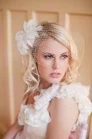 45 of 47 a dramatic blowout Vintage Birdcage Veil Veil Hairstyles Wedding Veil Vintage Vintage Wedding Hair
