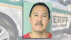 Man held in hit-and-run crash with motorcycle in South Bay