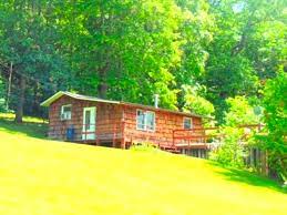 The first floor consists of two bedrooms, one with a queen size bed, the other with. Cabin Rental Akron Ohio Glamping Hub