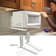 9 Genius Tips For Organizing Kitchens And Clearing The Clutter Kitchen Organization Microwave In Kitchen Kitchen Storage