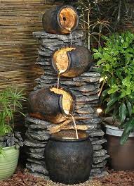 4 pots on rock fountain water feature jardin d eau fontaine de jardin jardins