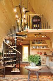 Metal spiral staircase with wooden tread on stairs. Adding A Spiral Staircase Extreme How To