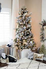 Christmas Tree With Gold Ornaments Plus Black And White Striped Ribbon Cool Christmas Trees Christmas Tree Inspiration White Christmas Trees