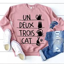 Everyone loves a good pun and we have the purrfect one for cat lovers! Official Un Deux Trois Cat Shirt Hoodie Tank Top And Sweater