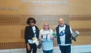 Members of the steering committee of the Cancer Society, Haifa branch:  Dalia Davidovitz, Moti Wagner and the branch coordinator, Adi Rubin  (private album)