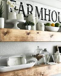 I Think I Like My Farmhouse Sign Better Here I Had To Move Some Stuff Around After Getting My Floating Shelves Floating Shelf Decor Rustic Floating Shelves