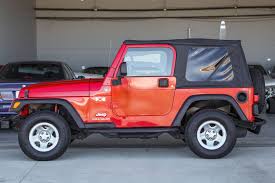 Image result for Flame Red 2006 Jeep