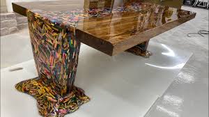 This is an epoxy coffee table with live edge walnut slabs, blue epoxy resin, a steel base, and multicolor leds! Thousands Of Pencils Floating Down A River Table Youtube