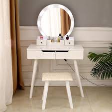 The silver chair fabric creates a glamorous touch. Winado Vanity Set With Round Lighted Mirror Makeup Dressing Table With 8 Light Bulbs Cushioned Stool Set Bedroom Vanities Set White