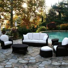 Furnitures Black Wicker Patio Furniture White Cushions With Round Wicker Table Above Stone Floor Beside A Pool Conversation Set Patio Patio Wicker Furniture