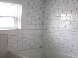 White tile on the bathroom floor keeps. Beveled Edge Subway Tile For Bathroom Beveled Subway Tile Subway Tile Tile Bathroom
