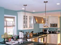 White And Glass Cabinets Aqua Walls Stainless Steel Appliances Teal Kitchen Walls Aqua Kitchen White Kitchen Cupboards