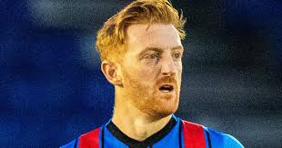 Livingston boss Martindale confirms interest in midfielder Carson