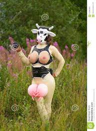 Cute Fetish Topless Cow Wearing Latex Bdsm Costume and Walking Alone in the  Field of Flowers Stock Photo - Image of bdsm, green: 122062982