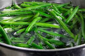 Shocking the beans in ice water stops the cooking process and helps set the vibrant green color. Blanching Green Vegetables Techniques The Noil Kitchen