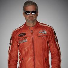 The racing jacket includes a retainer strap (removable) and swappable oakley icons. Gulf Racing Jacket Orange Leather Jackets