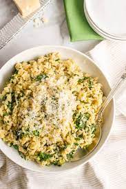A helpful tip would be to fry it for a bit before you add water for it to cook faster. Brown Rice With Spinach And Parmesan Cheese Family Food On The Table