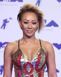 Mel b chooses style over comfort in slinky leather outfit as she touches down at lax. Mel B S New Eye Catching Hair Transformation Is A Must See