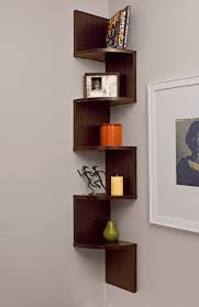 This idea not only utilizes the corner as a great spot for a shelf, but it ups the game a little bit by also incorporating a hanging rail. 7 Main Types Of Corner Shelves Used For Decor And Storage Home Stratosphere