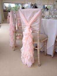 blush pink ruffle chair cover hoods supplied by the midlands events company dressed by cha bridal chair cover bridal chair decorations wedding chair sashes
