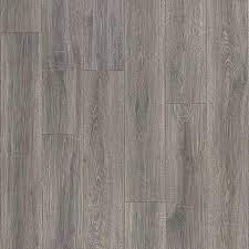 Waterproof laminate flooring is, well, even better than the original! Pergo Portfolio Wetprotect Waterproof Trenton Oak 7 48 In W X 47 24 In L Waterproof Embossed Wood Plank Laminate Flooring 22 09 Sq Ft In The Laminate Flooring Department At Lowes Com