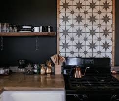 For their new kitchen, michaël verheyden and saartje vereecke incorporated a smeg cooktop, oven, and range hood, stainless steel cabinets from. Black Kitchen Ideas Dwell