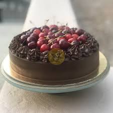 Since we deliver only freshly baked cakes, all orders having cake products can be delivered only after noon time, irrespective of delivery type selected. Chocolate Ganache Cake Fresh Fruit Flower Finish Weight 1kg