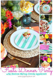 A mexican party table displays exotic cocktails, chilled margaritas, appetizers, and desserts. Mexican Dinner Party Decorations Sarahlcookson