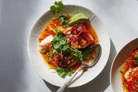 Tomato Poached Fish With Chile Oil And Herbs Recipe Recipe Poached Fish Herb Recipes Cooking