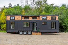 It's a customized version of the loft model from mint tiny house, a company near vancouver that builds microstructures on trailer frames. Modern Bohemian Tiny House Can Accommodate Up To Six People