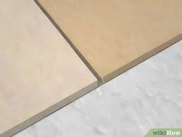 If you want light grout, use white thinset. How To Install Marble Floor Tile With Pictures Wikihow