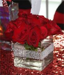 A daring colour combination brought to life by our team of florists, each flower in this design is balanced perfectly to form a cohesive whole: Sweet 16 Centerpieces Red Roses Centerpieces Rose Centerpieces Wedding Centerpieces