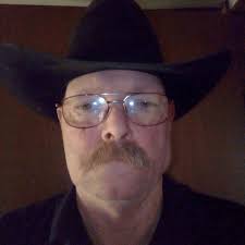 Why did the high test portion of the moonshine turn yellow after 4 days?