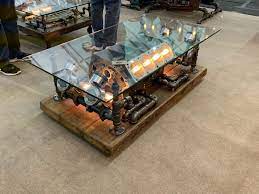 Made from ls alloy engine blocks, each one stripped, cleaned, polished, painted and assembled to create this magnificent piece of furniture for all of the automotive enthusiasts out there! Steampunk Coffee Table Made Of Carroll Shelby Engine Block