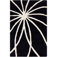 The easiest way to give any room a cool makeover is to throw in a swanky rug. Chamba Handmade Transitional Wool Area Rug