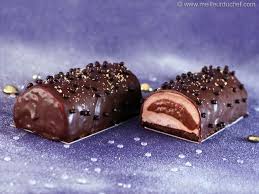 Buche De Noel A La Mousse De Marron Et Son Cœur Fondant De Caramel Au Beurre Sale Recette Mousse De Marron Buche De Noel Bols En Chocolat