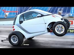 It's a car to guide with your fingertips and sweep languidly along, not pick out apex points. Big Block Smart Car Pulls Wheelies Sounds Like The Apocalypse
