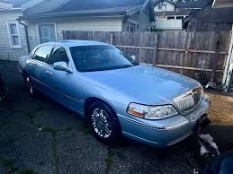 Image result for Light Ice Blue 2005 Town Car