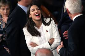 In a modern, moral, & wealthy society, no american should be too poor to live. Alexandria Ocasio Cortez S Style Popsugar Fashion