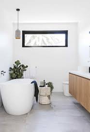 They are available in various beautiful designs, and there are. A Minimalist Coastal Home Is The Perfect Family Abode Bathroom Design Bathrooms Remodel Concrete Look Tile
