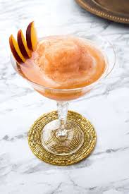 frozen peach aperol bellini liquid