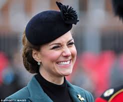 Kate Middleton: The Duchess of Cambridge keeps her cool as she leans