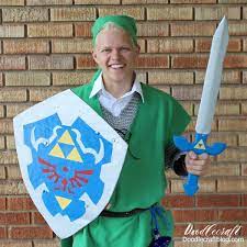 He runs around in a floppy hat solving puzzles and dispatching bad guys while trying to save the eponymous princess. Legend Of Zelda Link Cosplay With Hylian Shield Master Sword Diy