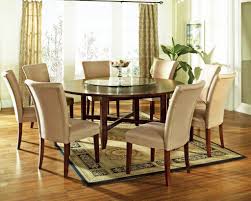 Breakfast nooks include a bench piece for a more spacious seating, making a great alternative to the standard chair. 9 Pc Avenue 72 Round Dining Table Set With Lazy Susan Steve Silver At Gowfb Ca Free Shipp Round Dining Room Table Round Dining Room Sets Round Dining Room