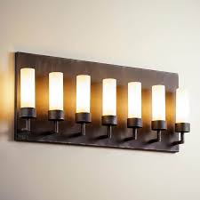 A fine and unique sheffield silver plate on copper three light candelabra with etched glass hurricane shades, adjustable to a single candle stick. Massive Wall Lamp With Seven Cylinder Glass Shades Wl3717 Casa Lumi